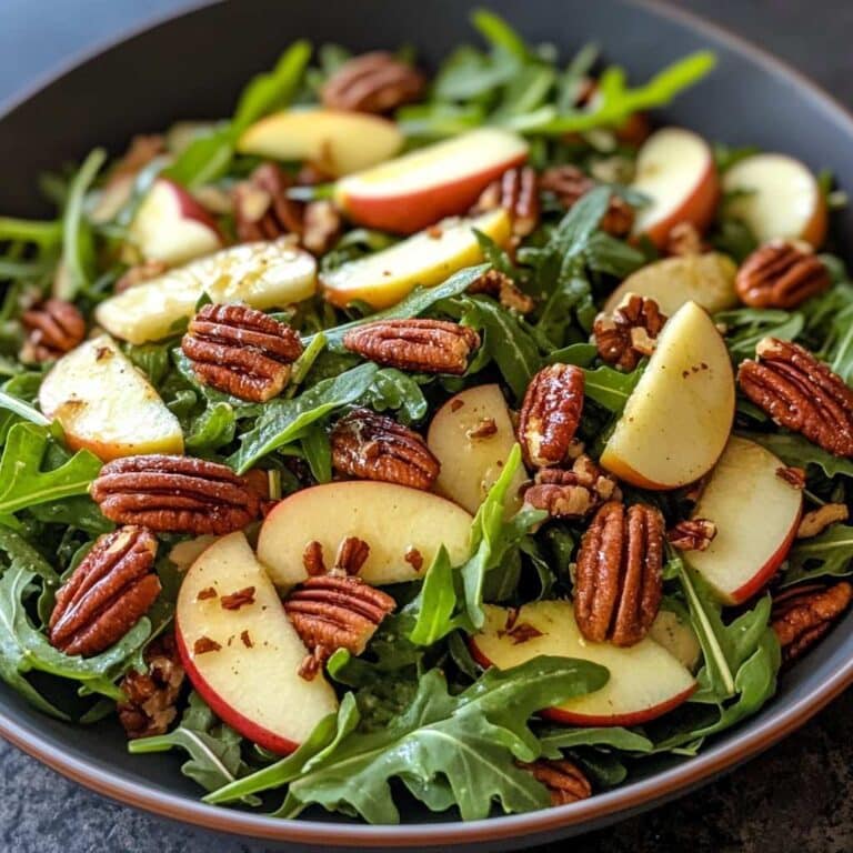 Ensalada de rúcula y manzana con nueces pecanas glaseadas con jarabe de arce Receta